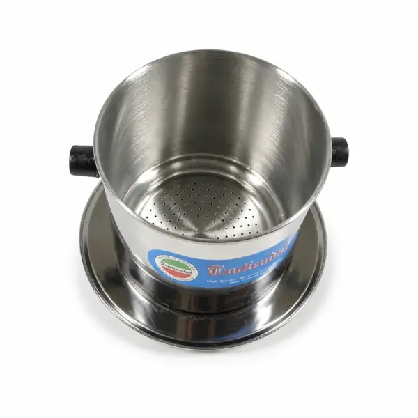 Vietnamese Stainless Steel Coffee Phin – Inner Filter View Inside view of Tan Tien Dat Vietnamese stainless steel coffee phin with perforated filter base