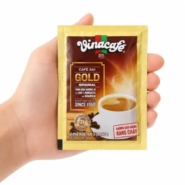 VinaCafe Gold Original 20g Coffee Sachet VinaCafe Gold Original 20g instant coffee sachet held in hand